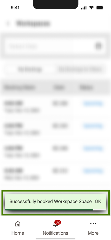 Toast confirms: 'Successfully booked Workspace Space' with OK; bottom navigation shows Home, Notifications(32), More.